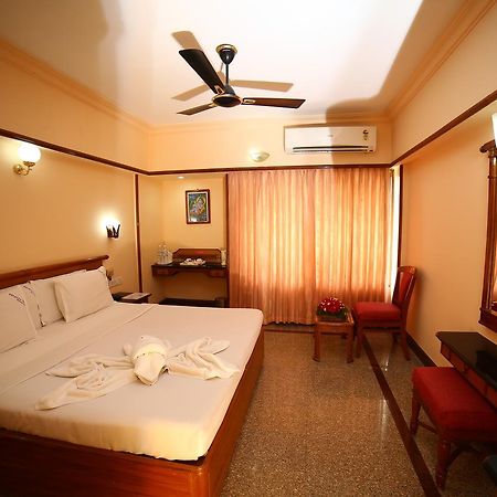 Mayura Residency Guruvāyūr Стая снимка